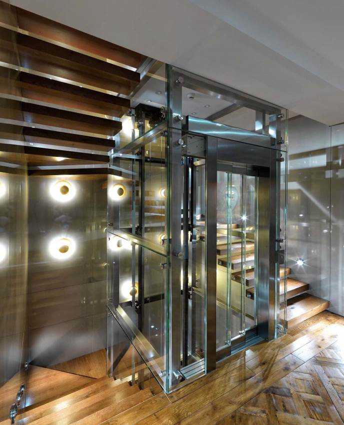 GLASS ELEVATOR CLADDING
